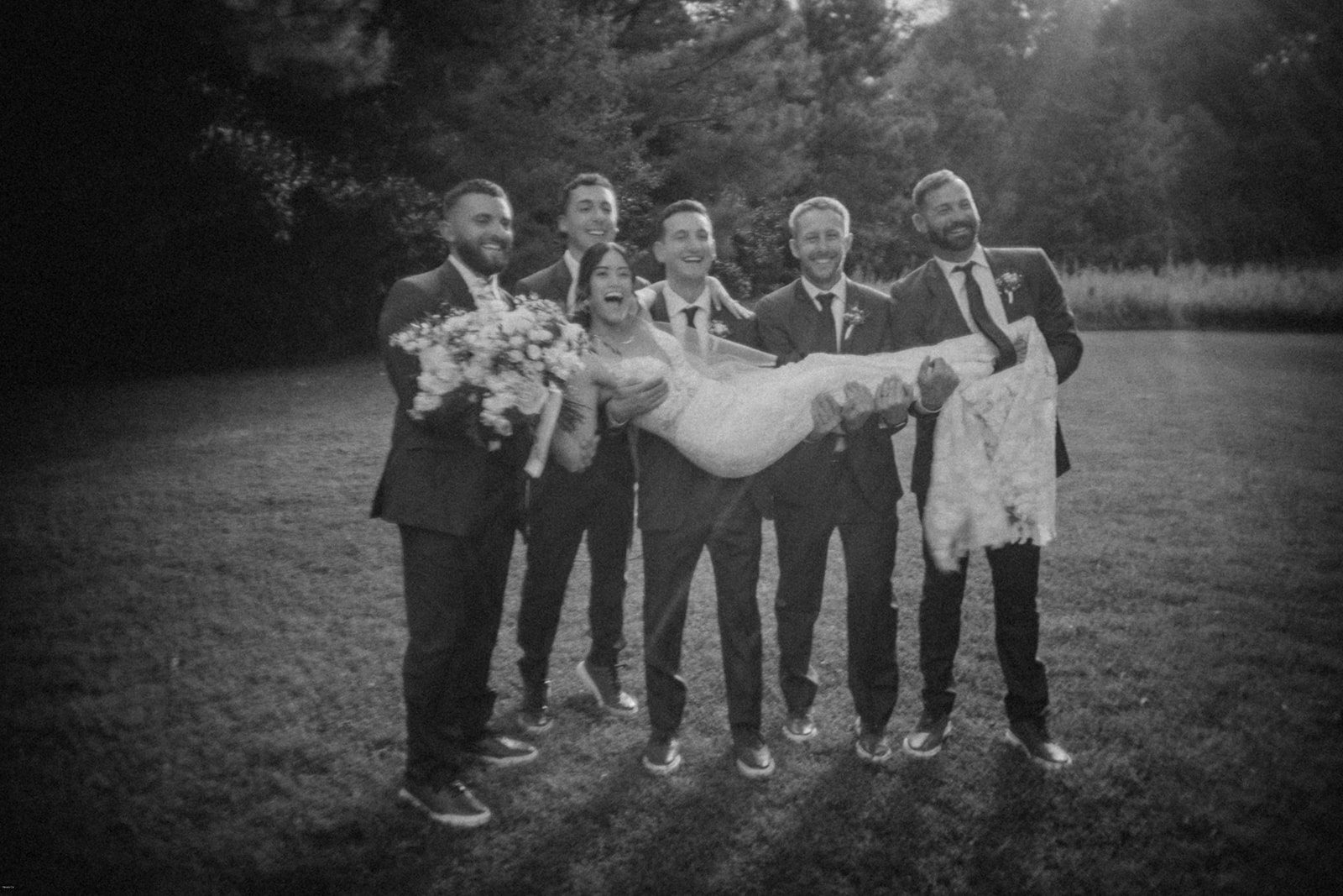 black and white bride and groom and the party