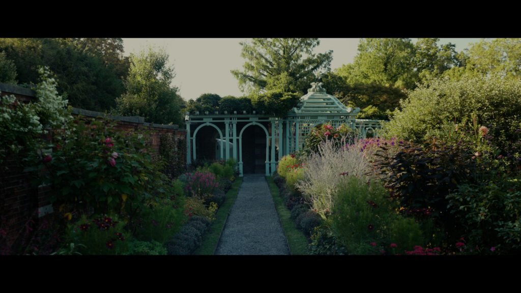 Od Westbury Gardens wedding ceremony location surrounded by lush gardens in the soft morning light